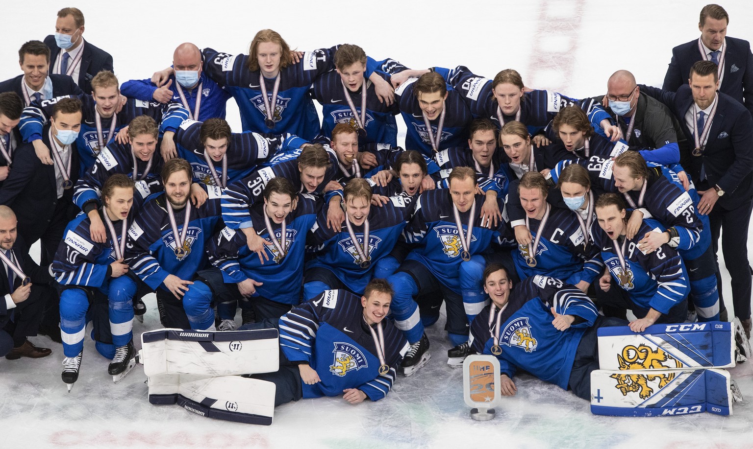 The team from Finland poses with bronze medals after defeating Russia in the third-place game of the IIHF World Junior Hockey Championship, Tuesday, Jan. 5, 2021, in Edmonton, Alberta. (Jason Franson/ ...