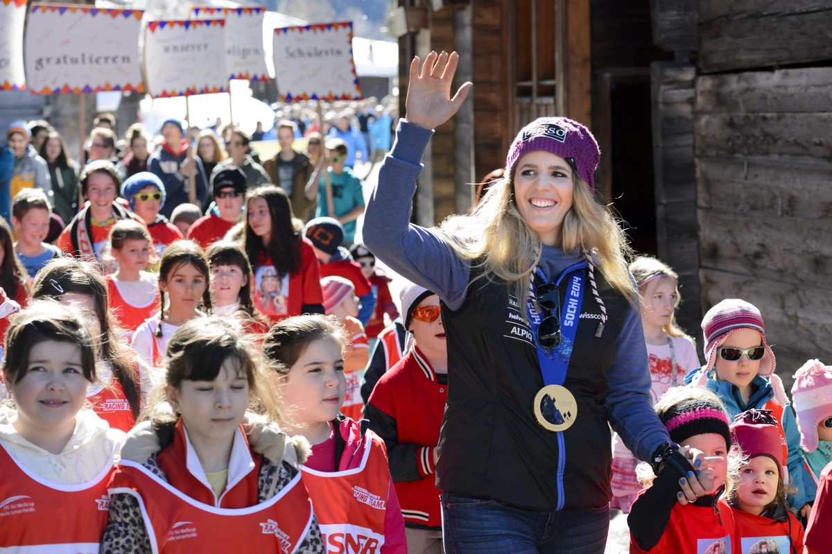 The women's snowboard parallel giant slalom gold medalist of the XXII Winter Olympics 2014 Sochi, Switzerland's Patrizia Kummer is celebrated in her hometown, in Ernen, Switzerland, Saturday ...