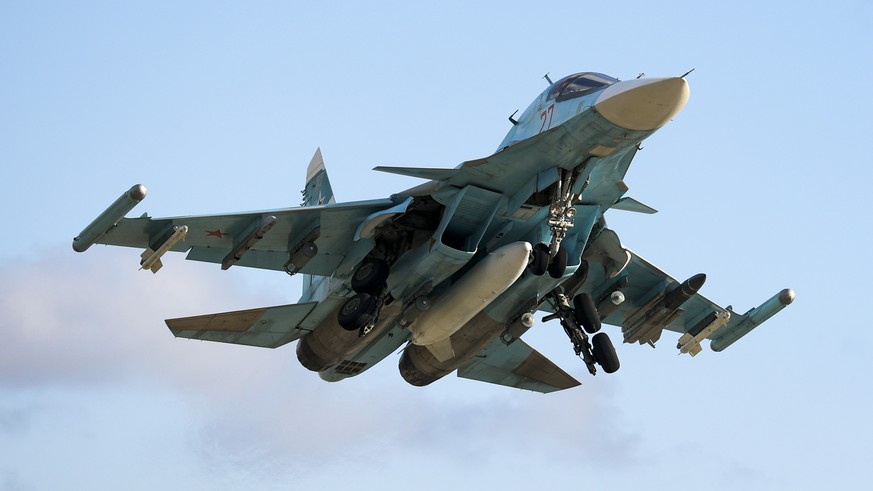 FILE - A Russian Su-34 bomber takes off for a training mission in Krasnodar Region, Russia, Wednesday, Jan. 19, 2022. With tens of thousands of Russian troops positioned near Ukraine, the Kremlin has  ...