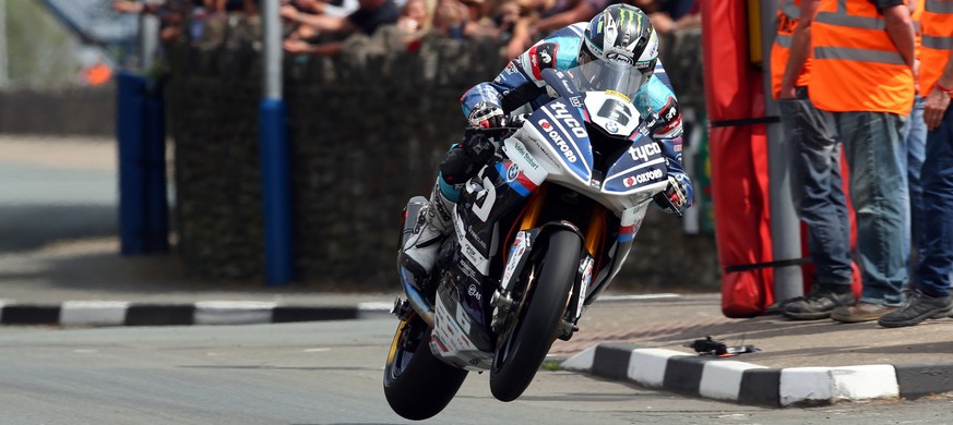 epa06794120 Michael Dunlop in action on his Tyco BMW, during the PokerStars Senior TT Race at the Isle of Man TT, Isle of Man, Britain, 8 June 2018. EPA/Tim Keeton