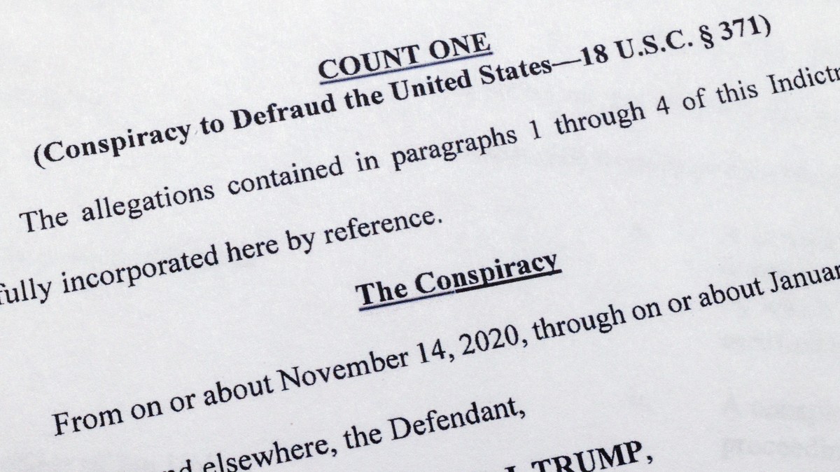 The indictment against former President Donald Trump charging him by the Justice Department for his efforts to overturn the results of the 2020 presidential election is photographed Tuesday, Aug. 1, 2 ...