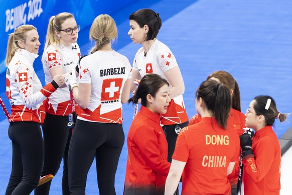 Switzerland skip Silvana Tirinzoni, left, and her teammates Alina Paetz, 2nd left, Melanie Barbezat and Esther Neuenschwander, right, react during the women&#039;s Round Robin #2 game between China an ...