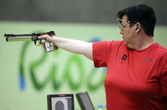 Heidi Diethelm Gerber of Switzerland competes during the women's 10-meter air pistol qualification at Olympic Shooting Center at the 2016 Summer Olympics in Rio de Janeiro, Brazil, Sunday, Aug. 7, 2016. (AP Photo/Eugene Hoshiko)