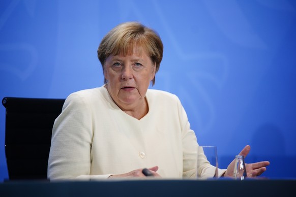 epa08706239 German Chancellor Angela Merkel speaks during a press conference after the meeting of German Federal State Premiers at the Chancellery in Berlin, Germany, 29 September 2020. The German Pri ...