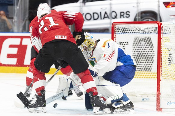 Switzerland&#039;s Kevin Fiala scores the 6:0 against Italy`s Andreas Bernard during the game between Switzerland and Italy, at the IIHF 2019 World Ice Hockey Championships, at the Ondrej Nepela Arena ...