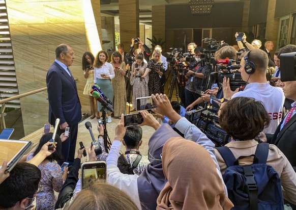 epa10058639 Russia?s Foreign Minister Sergei Lavrov is surrounded by press members at a doorstep during the G20 Foreign Ministers? Meeting in Nusa Dua, Bali, Indonesia, 08 July 2022. Bali hosts the tw ...