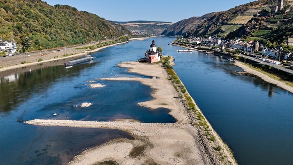 The Zollburg Pfalzgrafenstein toll castle is seen in the middle of the Rhine river with low water levels, in Kaub, Germany, Monday, Aug. 10, 2026. (AP Photo/Michael Probst)
APTOPIX Germany Extreme Wea ...