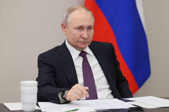 epa10522608 Russian President Vladimir Putin chairs a videoconference meeting on the implementation of the development programme for cities in the Russian Far East, in Ulan-Ude, the Republic of Buryat ...