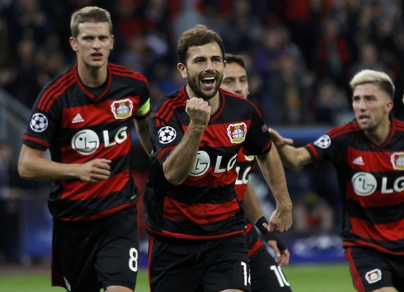 Bayer Leverkusen&#039;s Admir Mehmedi (C) reacts after scoring his first goal with Lars Bender (L) and Kevin Kampl against BATE Borisov during their Champions League group E soccer match in Leverkusen ...