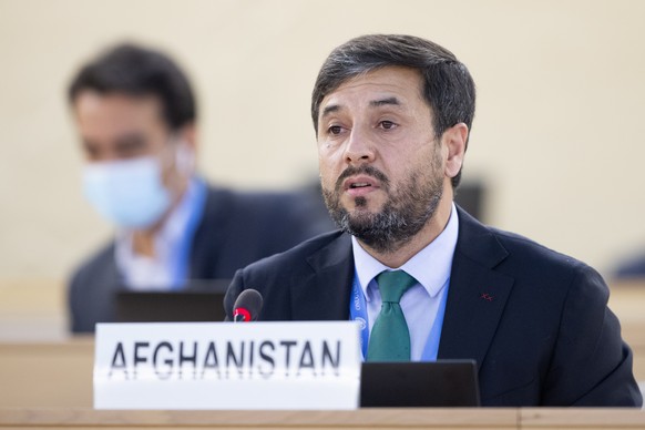 epa09427147 Nasir Ahmad Andisha, ambassador of the Permanent Representative Mission of the Islamic Republic of Afghanistan to Geneva, addresses his statement, during the Human Rights Council special s ...