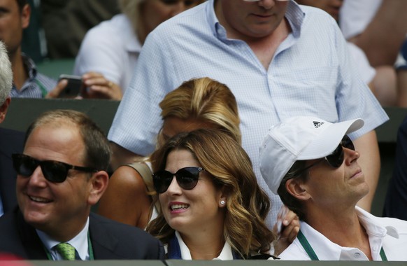 Mirka Federer sits on centre court before her husband, Roger Federer of Switzerland plays Sam Querrey of the U.S.A. at the Wimbledon Tennis Championships in London, July 2, 2015. REUTERS/Stefan Wermut ...