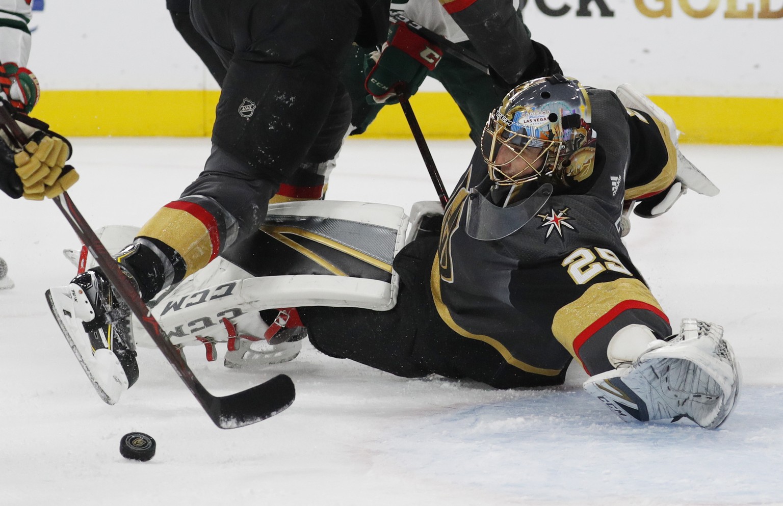 Vegas Golden Knights goaltender Marc-Andre Fleury (29) makes a save against the Minnesota Wild during the first period of an NHL hockey game Monday, Jan. 21, 2019, in Las Vegas. (AP Photo/John Locher)