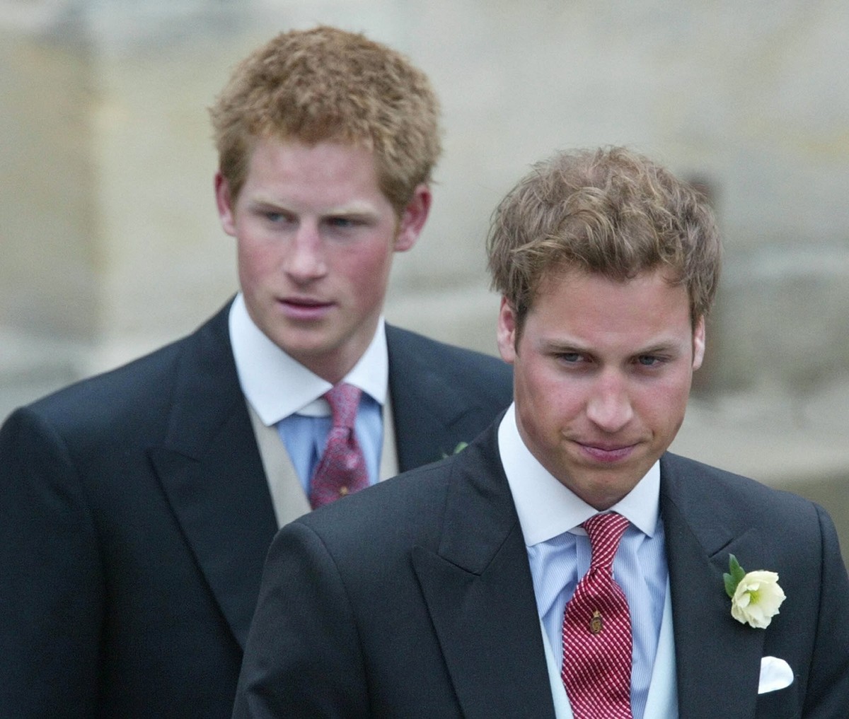 FILE - Britain's Prince William, right, and Prince Harry, left, after the marriage of their father Britain's Prince Charles, the Prince of Wales, and his wife Camilla, the Duchess of Cornwal ...