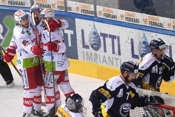 Rapperswil&#039;s player Nico Duenner right celebrate the 0 - 1 goal with Rapperswil&#039;s player Casey Wellman left and Rapperswil&#039;s player Andrew Rowe center, during the preliminary round game ...