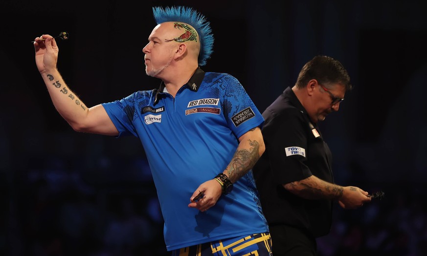 IMAGO / Action Plus

2nd January 2022; Alexandra Palace, London, England: The William Hill World Darts Tournament, semi finals; Peter Wright in action during his match against Gary Anderson PUBLICATIO ...