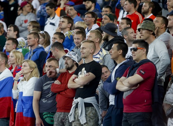 Russian supporters watch the Euro 2016 Group B soccer match between Russia and Slovakia at the Pierre Mauroy stadium in Villeneuve dÂAscq, near Lille, France, Wednesday, June 15, 2016. (AP Photo/Mich ...