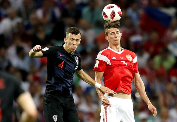 epa06872145 Ilya Kutepov of Russia (R) and Ivan Perisic of Croatia in action during the FIFA World Cup 2018 quarter final soccer match between Russia and Croatia in Sochi, Russia, 07 July 2018.

(RE ...