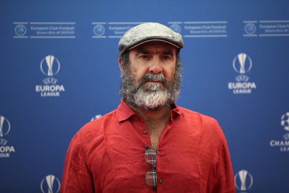French former soccer star Eric Cantona poses to the photographers before the UEFA Champions League group stage draw at the Grimaldi Forum, in Monaco, Thursday, Aug. 29, 2019. (AP Photo/Daniel Cole)
Er ...