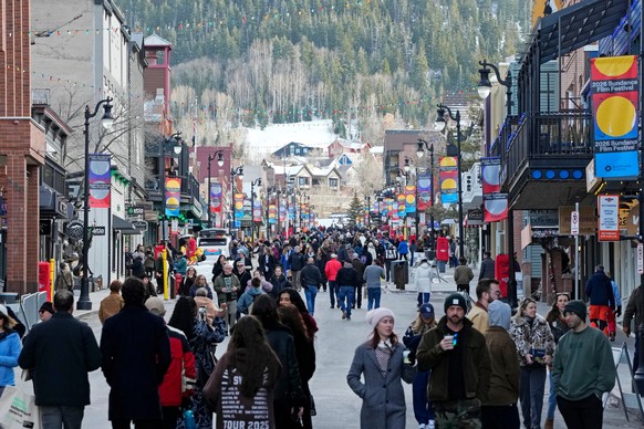 Pedestrians walk down Main Street on the first day of the 2026 Sundance Film Festival on Thursday, Jan. 22, 2026, in Park City, Utah. (Photo by Charles Sykes/Invision/AP)
2026 Sundance Film Festival