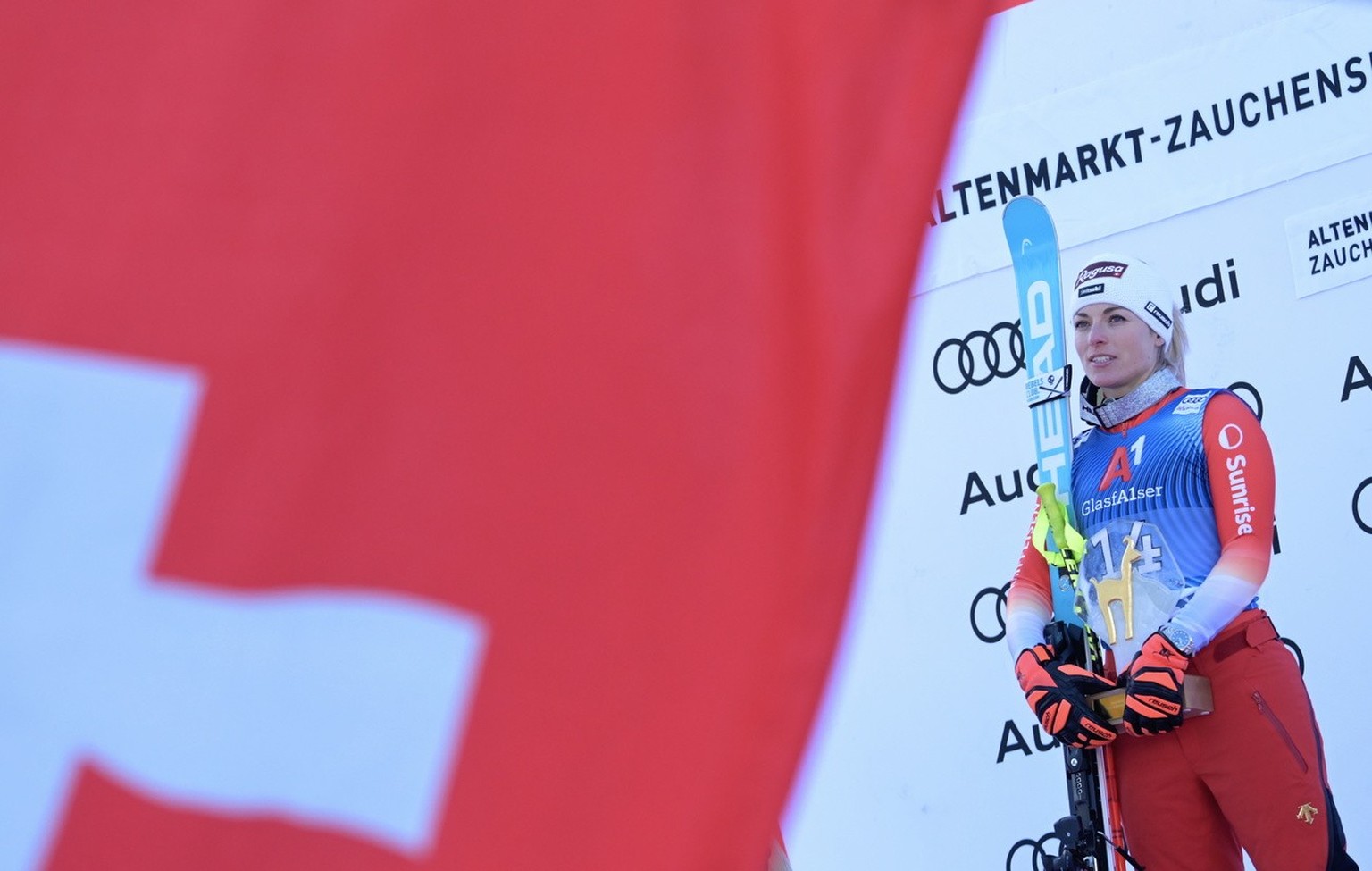 epa11075875 Winner Lara Gut Behrami of Switzerland celebrates on the podium after the Women&#039;s Super G race at the FIS Alpine Skiing World Cup in Zauchensee, Austria, 14 January 2024. EPA/CHRISTIA ...