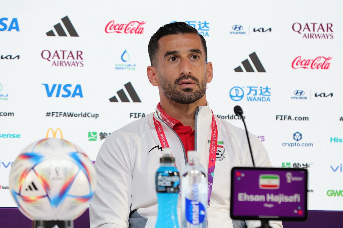 epa10316123 Iran player Ehsan Hajisafi attends a press conference at the Qatar National Convention Center (QNCC) in Doha, Qatar, 20 November 2022. Iran will face England in their first group B match o ...