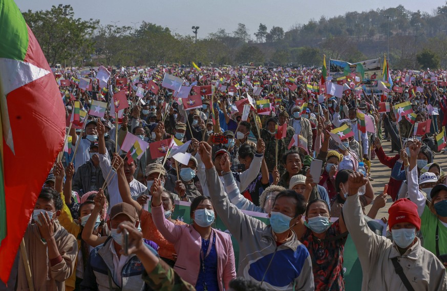 Supporters of Myanmar military wave Myanmar national flags during a rally supporting military coup in Naypyitaw, Myanmar, Thursday, Feb. 4, 2021. Myanmar&#039;s new military government has blocked acc ...