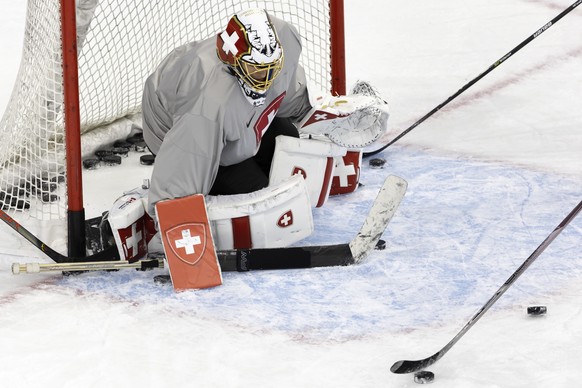 Switzerland&#039;s goaltender Leonardo Genoni in action during a training of the Switzerland national ice hockey team ahead of the preliminary group B games at the 2022 Winter Olympics in Beijing, Chi ...