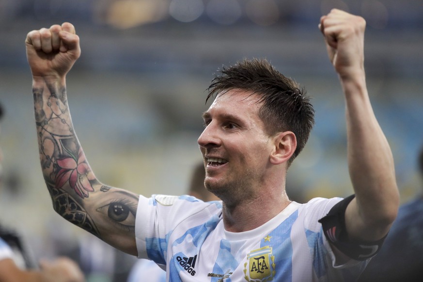 Argentina&#039;s Lionel Messi celebrates after beating Brazil 1-0 in the Copa America final soccer match at the Maracana stadium in Rio de Janeiro, Brazil, Saturday, July 10, 2021. (AP Photo/Bruna Pra ...