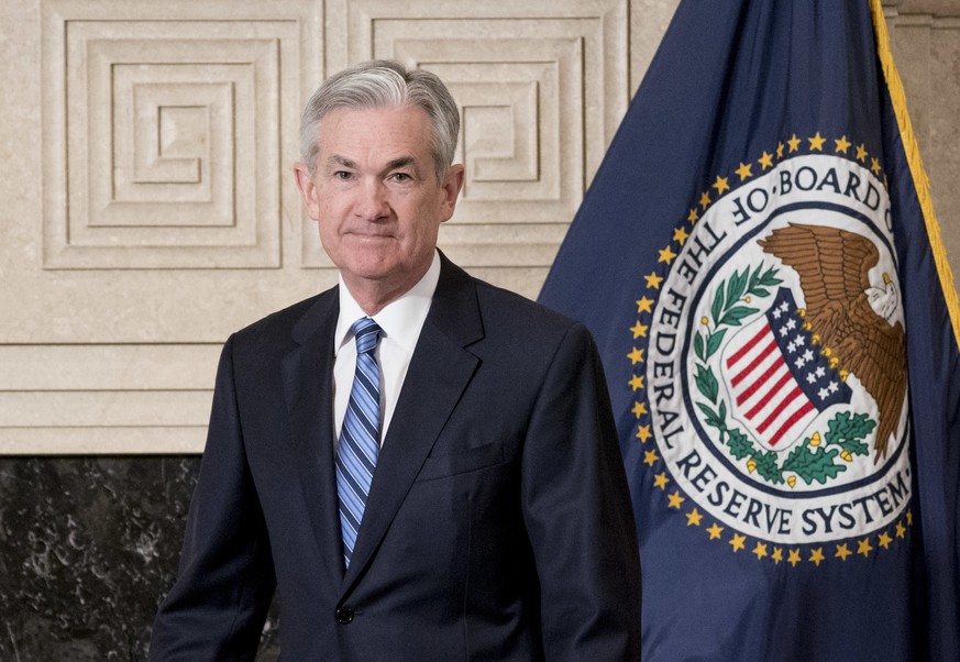 FILE- In this Feb. 5, 2018, file photo, Jerome Powell arrives to take the oath of office as Federal Reserve Board chair at the Federal Reserve in Washington. On Friday, Feb. 23, the Federal Reserve wi ...