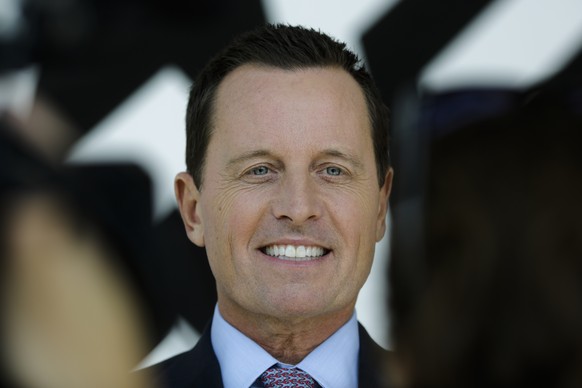 United States ambassador in Germany Richard Grenell talks with the Associated Press during an interview in Berlin, Germany, Tuesday, Aug. 21, 2018 on the deportation of former Nazi concentration camp  ...