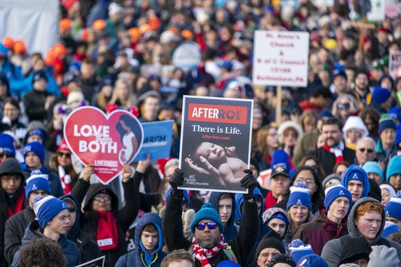 epa10419050 Anti-abortion activists from across the country participate in the annual March for Life on the National Mall in Washington, DC, USA, 20 January 2023. Abortion opponents rallied on the Nat ...