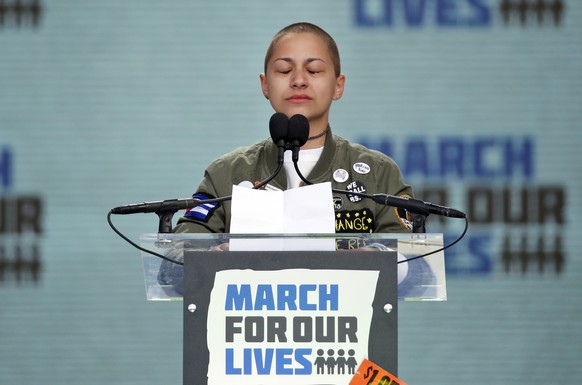 FILE - In this March 24, 2018 file photo, Emma Gonzalez, a survivor of the mass shooting at Marjory Stoneman Douglas High School in Parkland, Fla., closes her eyes and cries as she stands silently at  ...