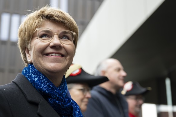 La presidente de la Confederation nouvellement elue Viola Amherd sourit lors de la celebration de son election a la presidence du Conseil federal, le jeudi, 21 decembre 2023 a Sion. (KEYSTONE/Anthony  ...