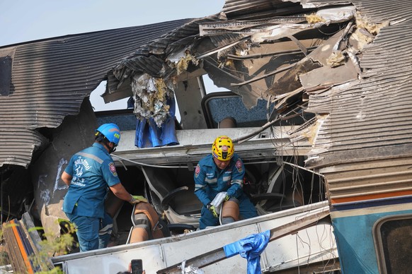 Rescuers work after a construction crane fell into a passenger train in Nakhon Ratchasima province, Thailand, Wednesday, Jan.14, 2026. (AP Photo/Sakchai Lalit))
Thailand Train Accident