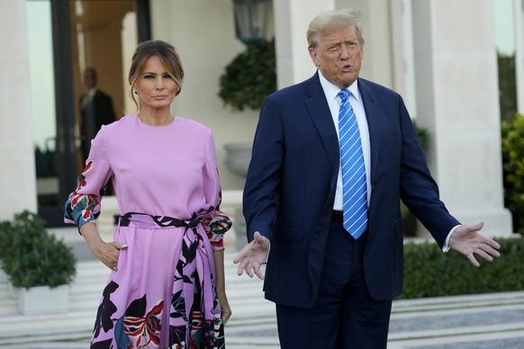 Former President Donald Trump, right, stands with Melania Trump as they arrive for a GOP fundraiser, Saturday, April 6, 2024, in Palm Beach, Fla. (AP Photo/Lynne Sladky)
Donald Trump,Melania Trump