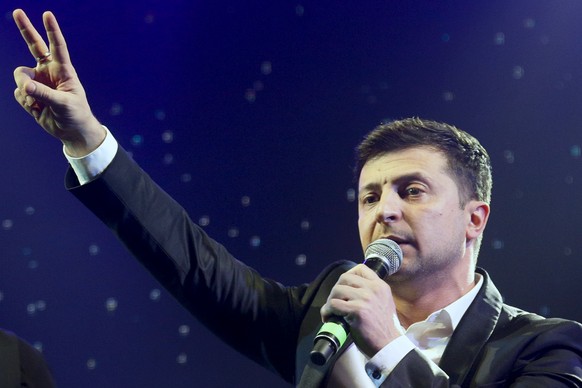 FILE In this file photo taken on Friday, March 29, 2019, Ukrainian comedian Volodymyr Zelenskiy hosts a comedy show at a concert hall in Brovary, Ukraine. Zelenskiy has no political experience but see ...