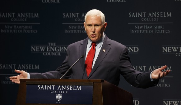 epa10125700 Former US Vice President Mike Pence addresses an audience during a visit to the &#039;Politics and Eggs,&#039; business gathering of the New Hampshire Institute of Politics, at St Anselm C ...