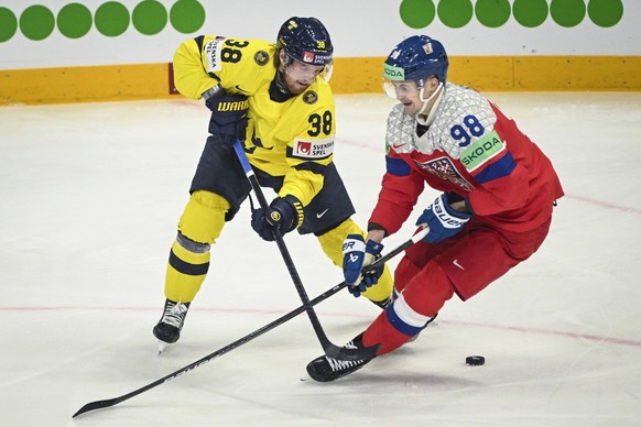 STOCKHOLM, SVERIGE 20250522 Sweden s Rasmus Sandin L and Czechia s Martin Necas in action during the IIHF Ice Hockey World Championship quarter final match between Sweden and Czech Republic at Avicii  ...