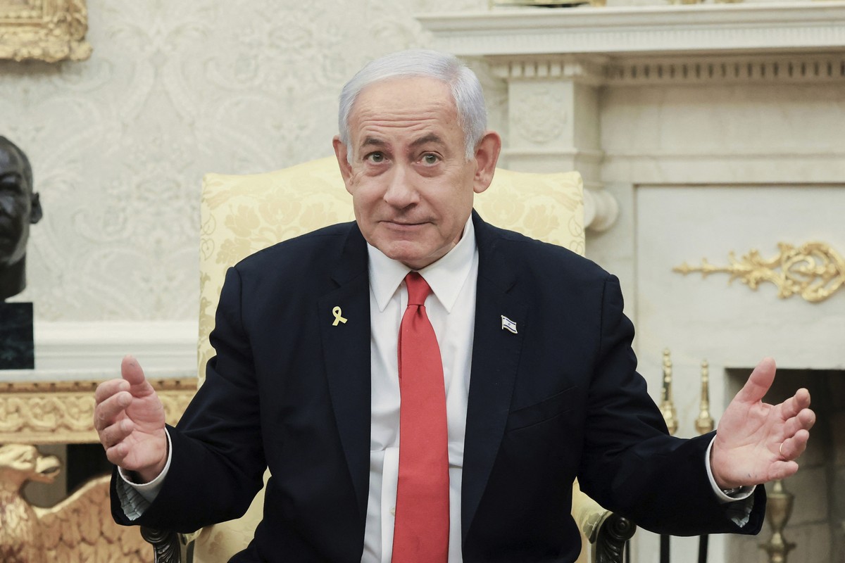 Israel's Prime Minister Benjamin Netanyahu speaks during a meeting with President Donald Trump in the Oval Office at the White House in Washington, Monday, April 7, 2025. (Pool via AP)
US Israel