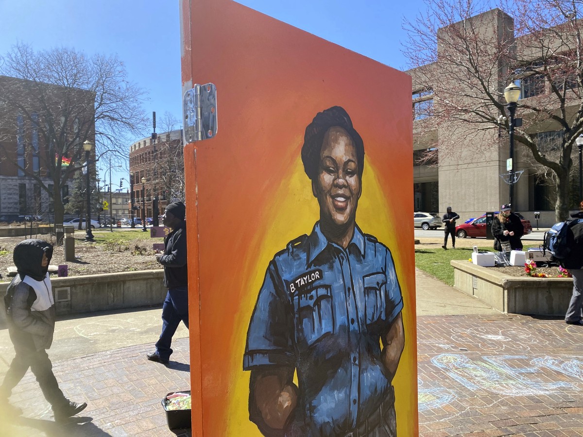 A painting of Breonna Taylor is among the art pieces decorating the center of Jefferson Square Park in Louisville, Ky., for a memorial on the two-year anniversary of Taylor's death, Sunday, March ...