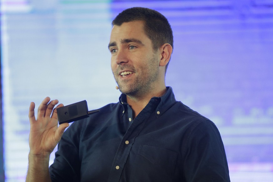 FILE- In this Feb. 27, 2017, file photo Facebook&#039;s Chief of Product officer, Chris Cox, speaks at the first day of the social media week at the Landmark centre in Lagos, Nigeria. Two top Facebook ...