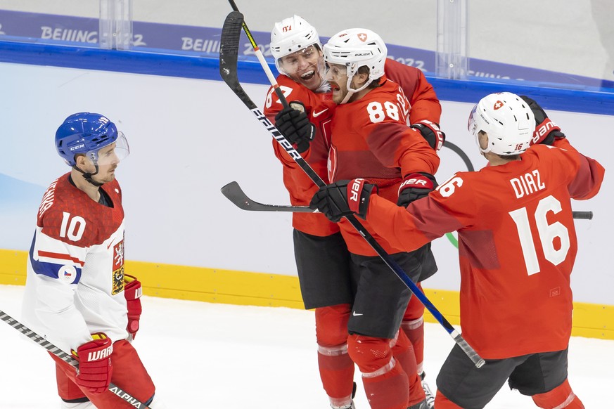 Switzerland&#039;s forward Killian Mottet, 2nd left, celebrates his goal with teammates forward Christoph Bertschy #88, and defender Raphael Diaz, right, pasta Czech Republic&#039;s forward Roman Cerv ...