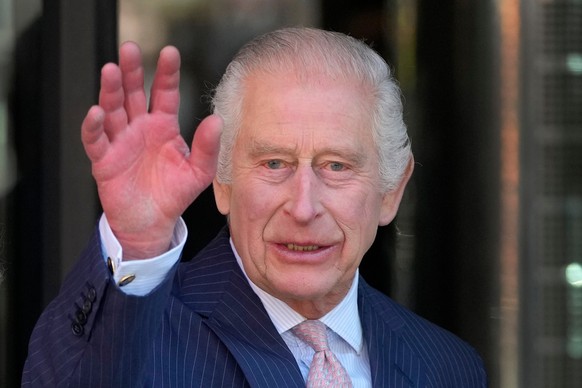 FILE -Britain's King Charles III waves as he arrives for a visit to University College Hospital Macmillan Cancer Centre in London, Tuesday, April 30, 2024. (AP Photo/Kin Cheung, File)
Britain Roy ...