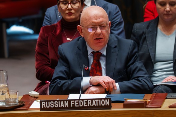 epa12774581 Vasily Nebenzya, Permanent Representative of Russia to the United Nations (UN), speaks during a UN Security Council meeting on peace and security marking the fourth anniversary of Russia&# ...