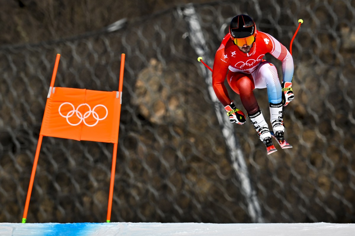 Loic Meillard of Switzerland competes in men's downhill training at the at the 2022 Olympic Winter Games in Yanqing, China, on Thursday, February 3, 2022. (KEYSTONE/Jean-Christophe Bott)..