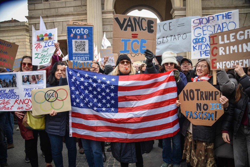 epa12695023 Demonstrators take part in a 'No ICE' protest in Milan, northern Italy, 31 January 2026, against the planned presence of US Immigration and Customs Enforcement (ICE) agents durin ...