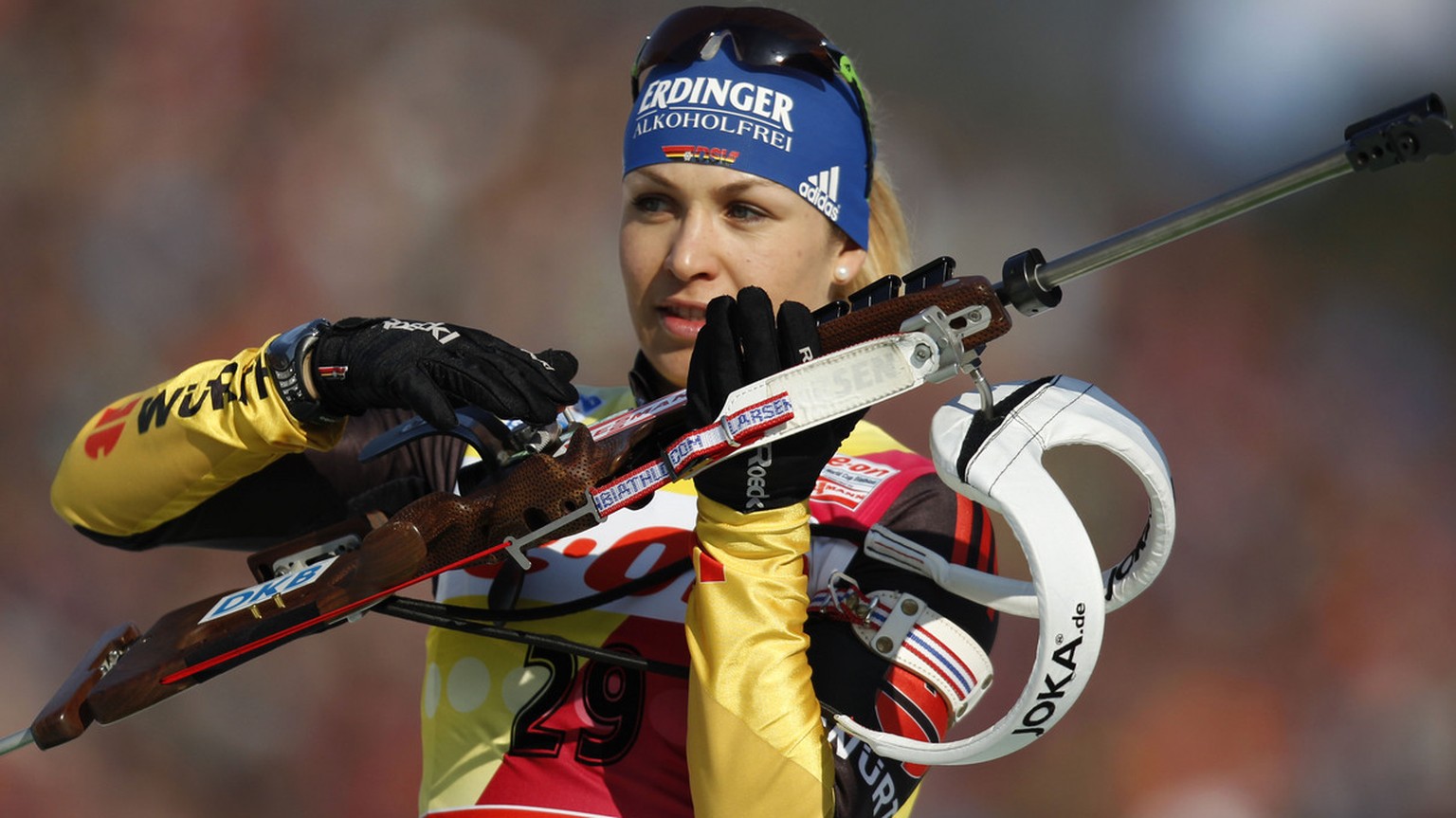 Magdalena Neuner of Germany prepares for a warm up shooting prior to the Women&#039;s 7.5 km Sprint competition at the Biathlon World Championships in Ruhpolding, Germany, Saturday, March 3, 2012. (AP ...