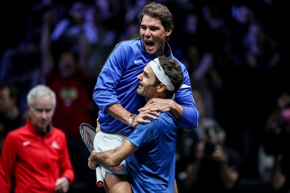 epa06224920 Switzerland&#039;s Roger Federer (down) and Spain&#039;s Rafael Nadal of the Team Europe celebrate after winning the Laver Cup tennis tournament in Prague, Czech Republic, 24 September 201 ...
