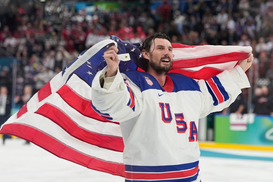 United States' Connor Hellebuyck (37) celebrate after defeating Canada during a men's ice hockey gold medal game between Canada and the United States at the 2026 Winter Olympics, in Milan, I ...