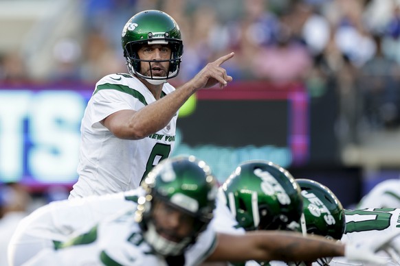 New York Jets quarterback Aaron Rodgers (8) calls out a play during the first half of an NFL preseason football game against the New York Giants, Saturday, Aug. 26, 2023, in East Rutherford, N.J. (AP  ...